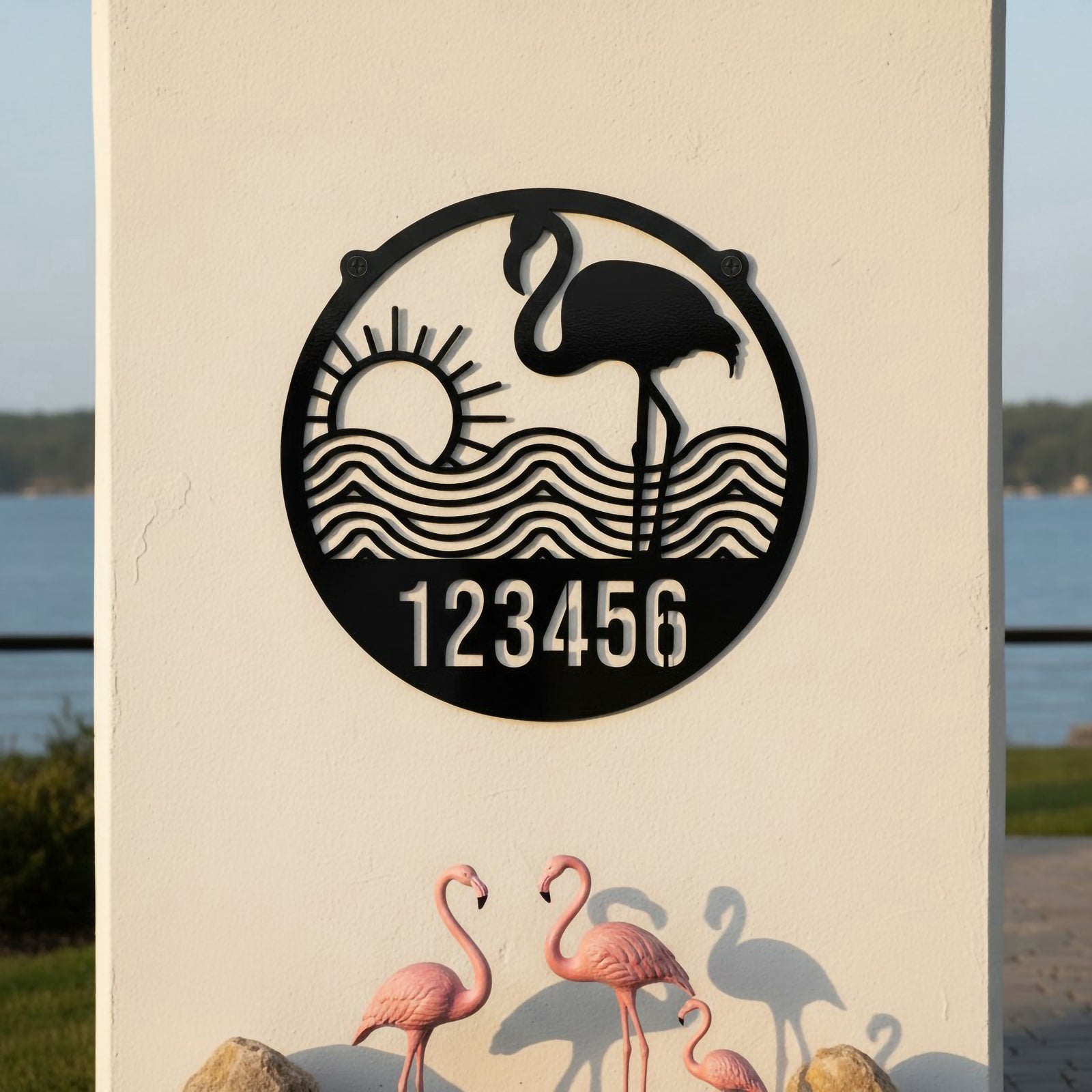 Gloss black flamingo metal house number sign with lake background and pink flamingo decor