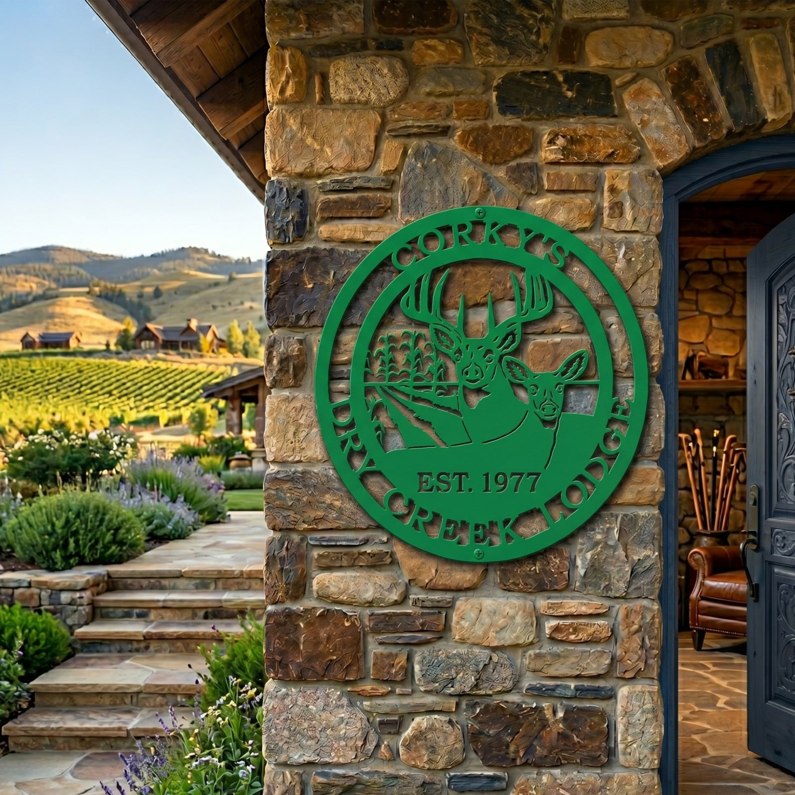 Green custom Corky’s Dry Creek Lodge metal sign with deer and farmland scene mounted on stone wall near rustic countryside lodge