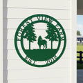 Green custom Forest View Farm metal sign with horse and pine tree design displayed on white exterior siding near farm fencing