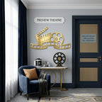 Gold cinema themed metal wall decor displayed in luxury theater room
