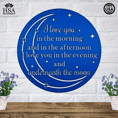 Custom Metal Quote Sign featuring a blue circular design with white text, a moon, and flower motifs, showcasing personalized script for home or office wall decor, crafted from durable steel.