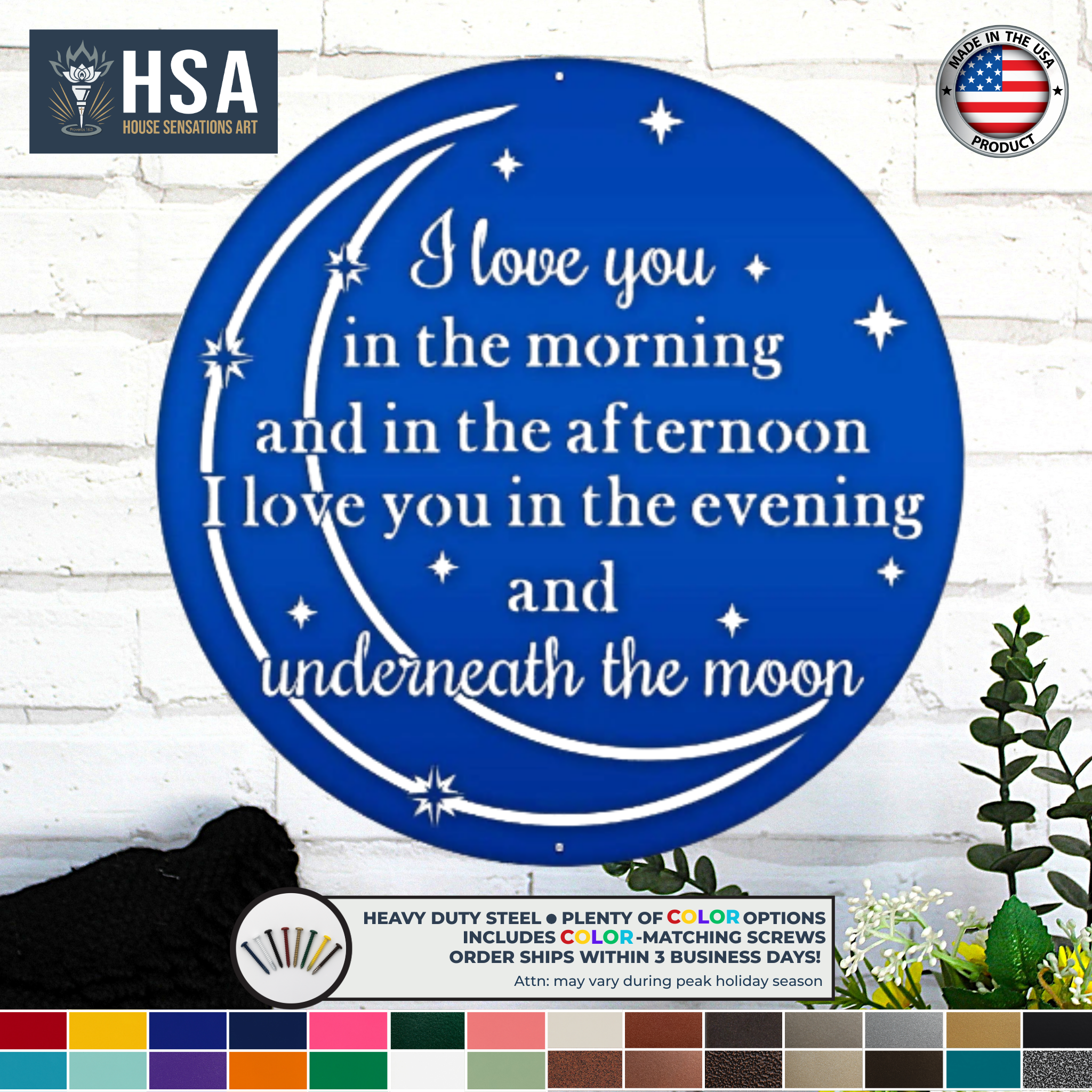 Blue round metal wall sign with moon stars and I love you quote displayed on white brick wall with color options for custom home decor gift or nursery wall art