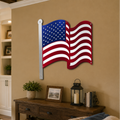 Metal American flag wall decor displayed above wooden console table in cozy farmhouse living room
