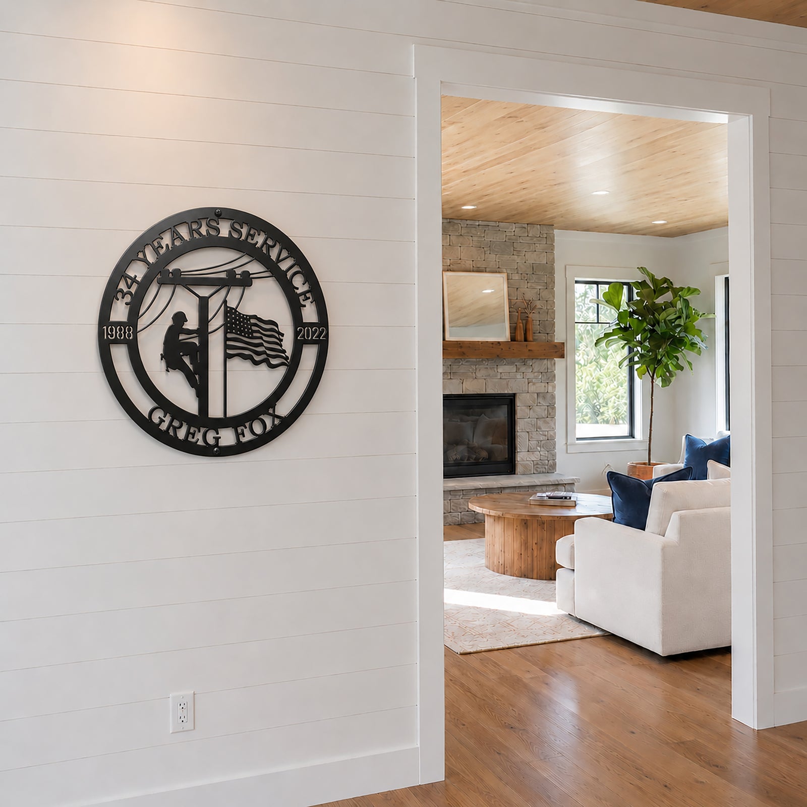 Black personalized lineman service metal wall sign displayed in modern farmhouse entryway