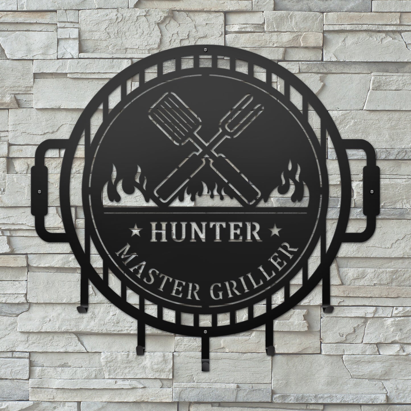 Grill Master Name Sign with Metal Hooks displaying grill utensils, perfect for organizing outdoor kitchen spaces. A customizable, durable metal décor piece from HouseSensationsArt, ideal for barbecue enthusiasts.