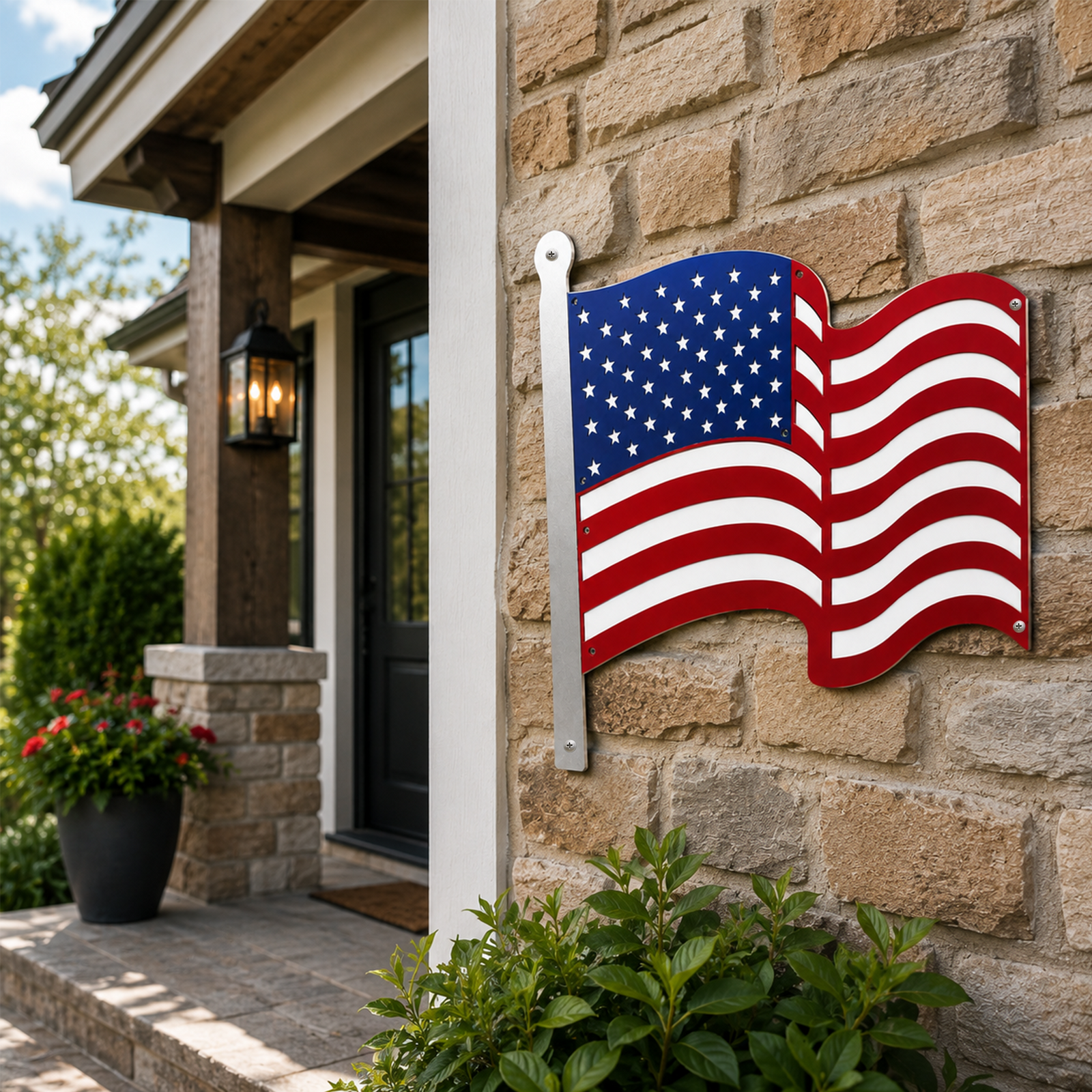 Metal American flag wall art displayed on stone exterior wall near front porch entryway