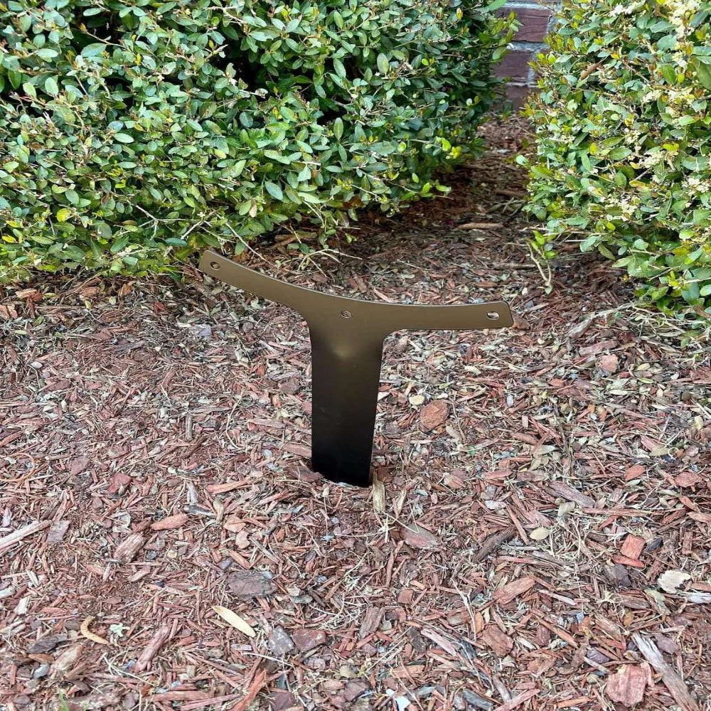 Black metal ground stake mounting bracket for securing outdoor metal signs in garden mulch landscaping and yard displays
