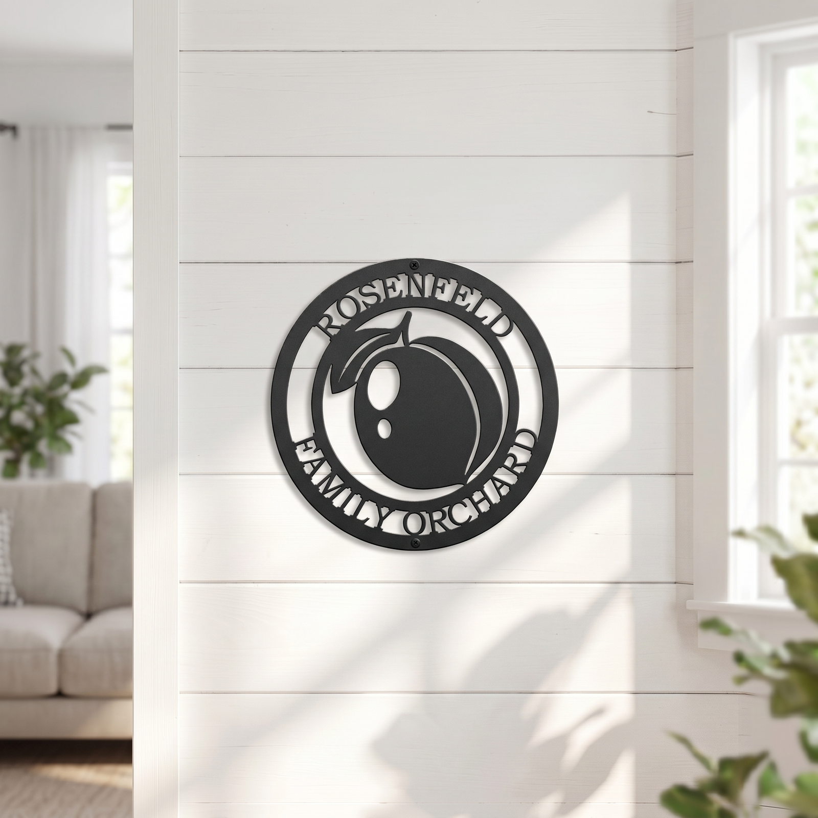Personalized peach orchard metal sign displayed on white shiplap wall in bright modern farmhouse interior