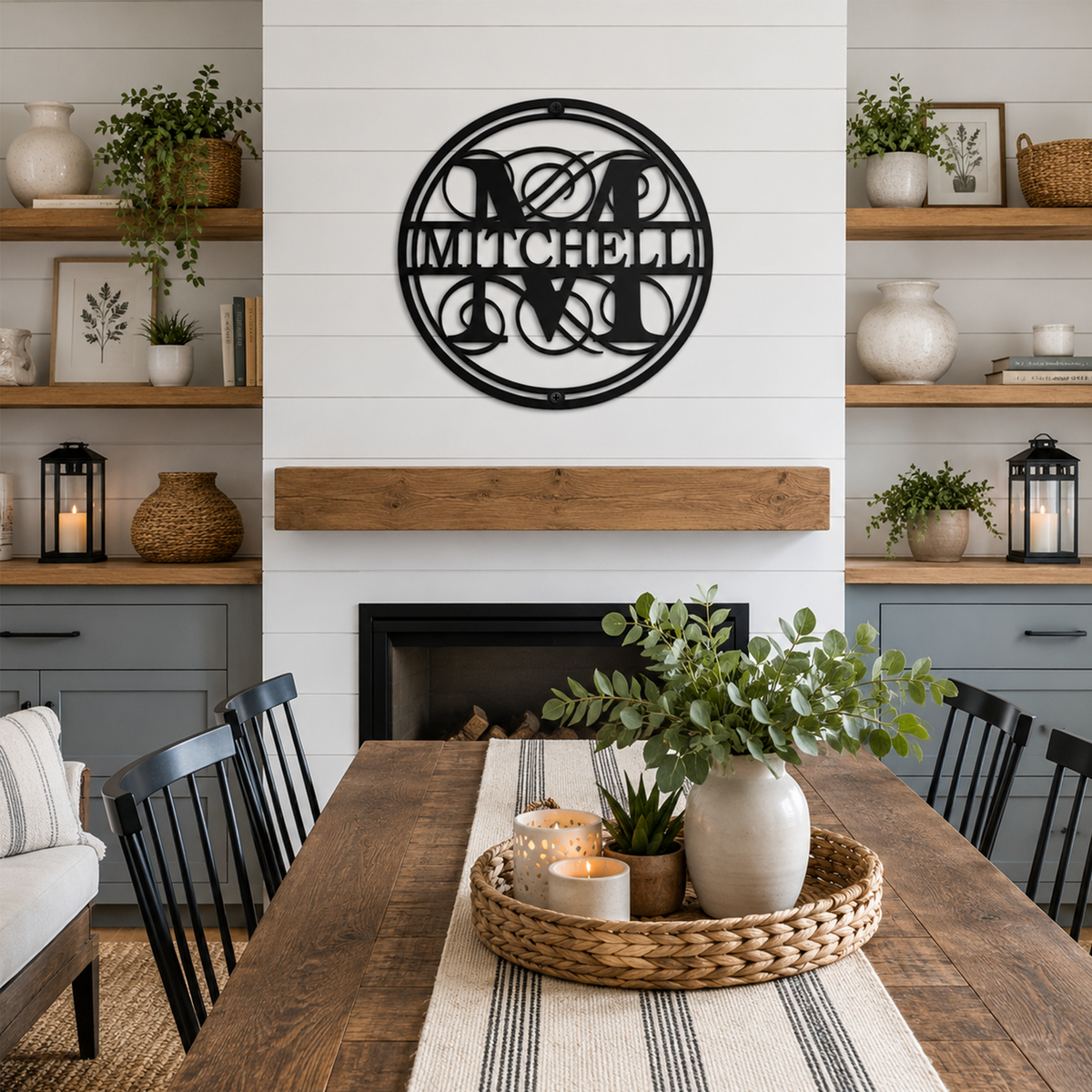Black personalized family name metal wall sign displayed above a farmhouse fireplace mantel with modern home decor