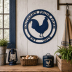 Navy blue rooster metal wall art displayed above farmhouse table with rooster themed country decor