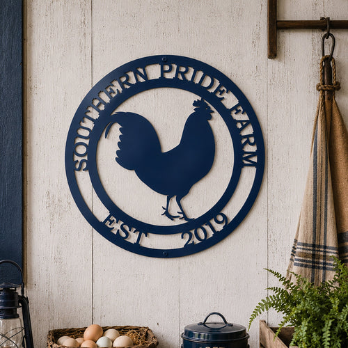 Navy blue rooster metal wall art displayed above farmhouse table with rooster themed country decor