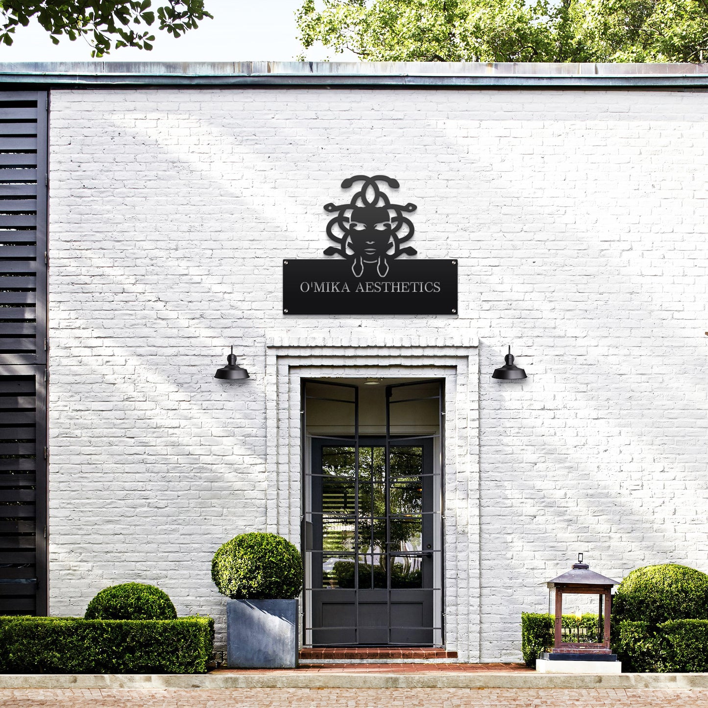 Custom STOREFRONT Brand/Business Logo Sign displayed on a white brick building, featuring a sleek, laser-cut design ideal for office or storefront use, embodying professionalism and durability from HouseSensationsArt.