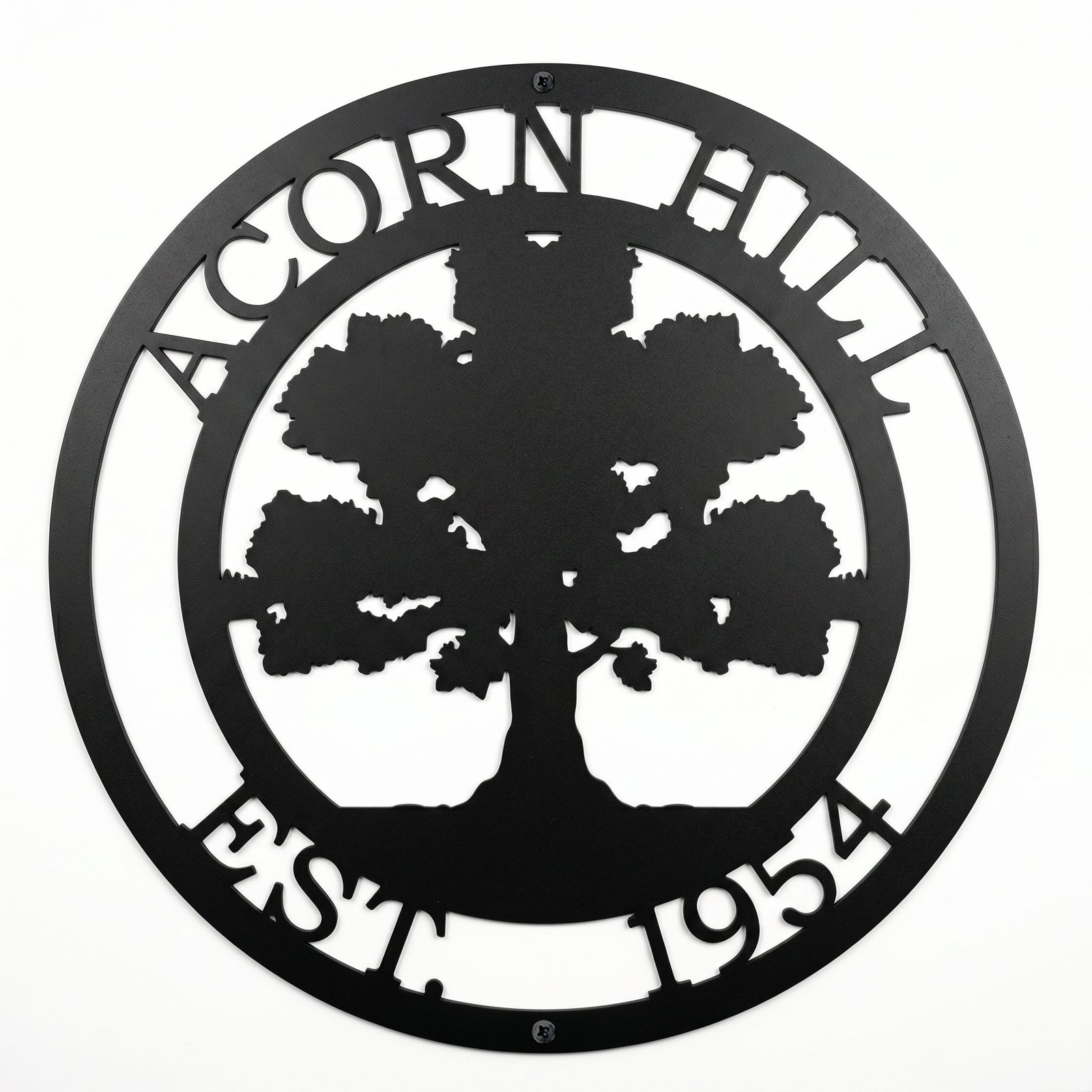 Black oak tree family name metal sign with established date on white background