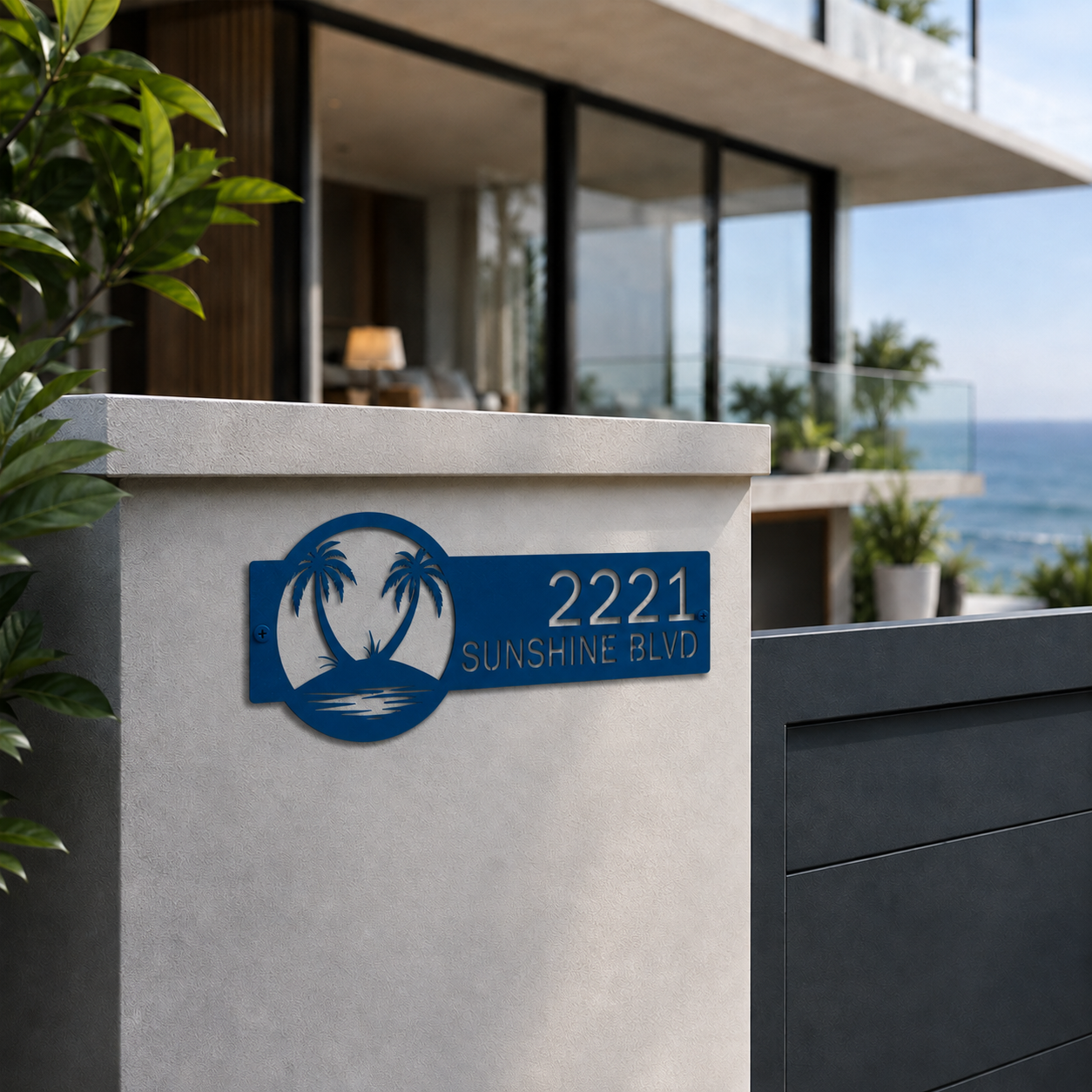 Ocean blue tropical palm tree metal address sign with custom house numbers mounted on modern coastal home entry wall
