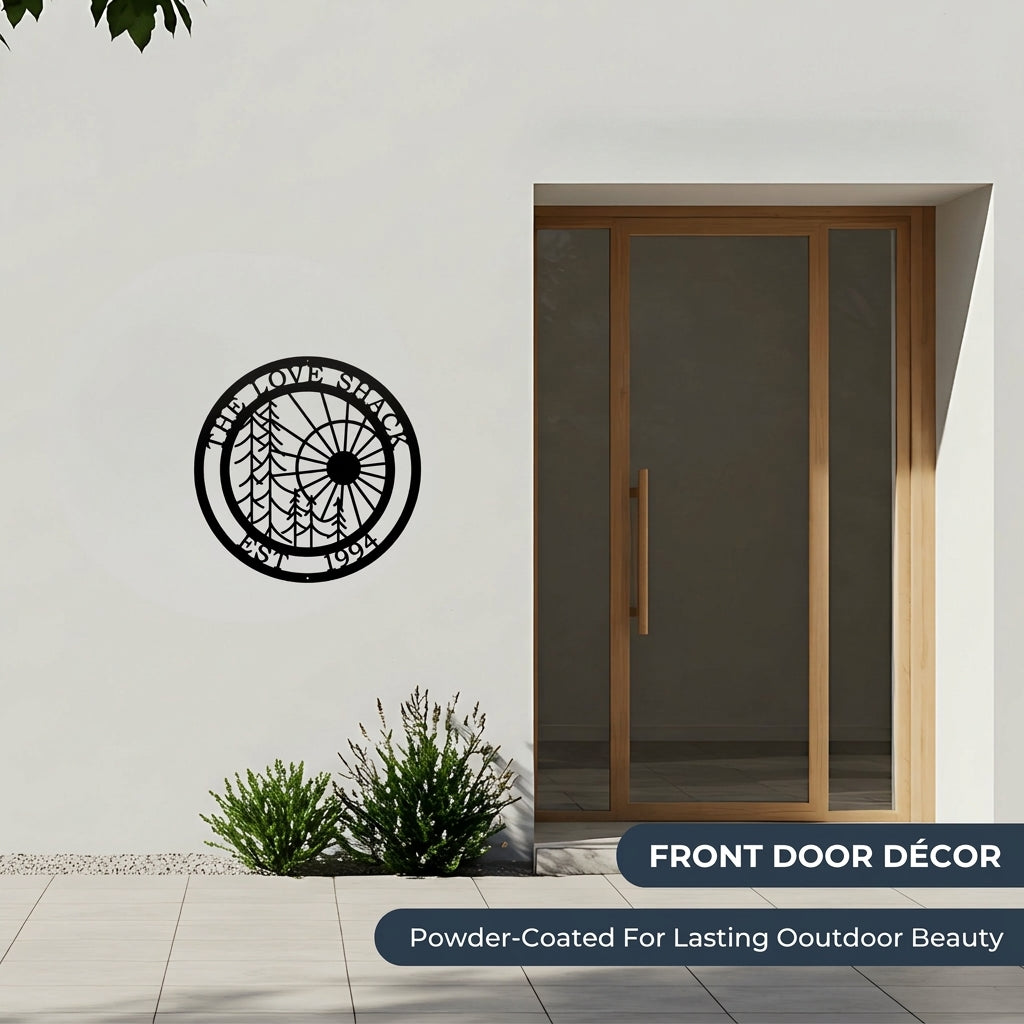 Custom tree and sun metal wall sign mounted beside front door with powder coated finish for outdoor durability