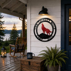 Personalized wolf metal wall art mounted on cabin porch wall with mountain lake view and rustic outdoor décor