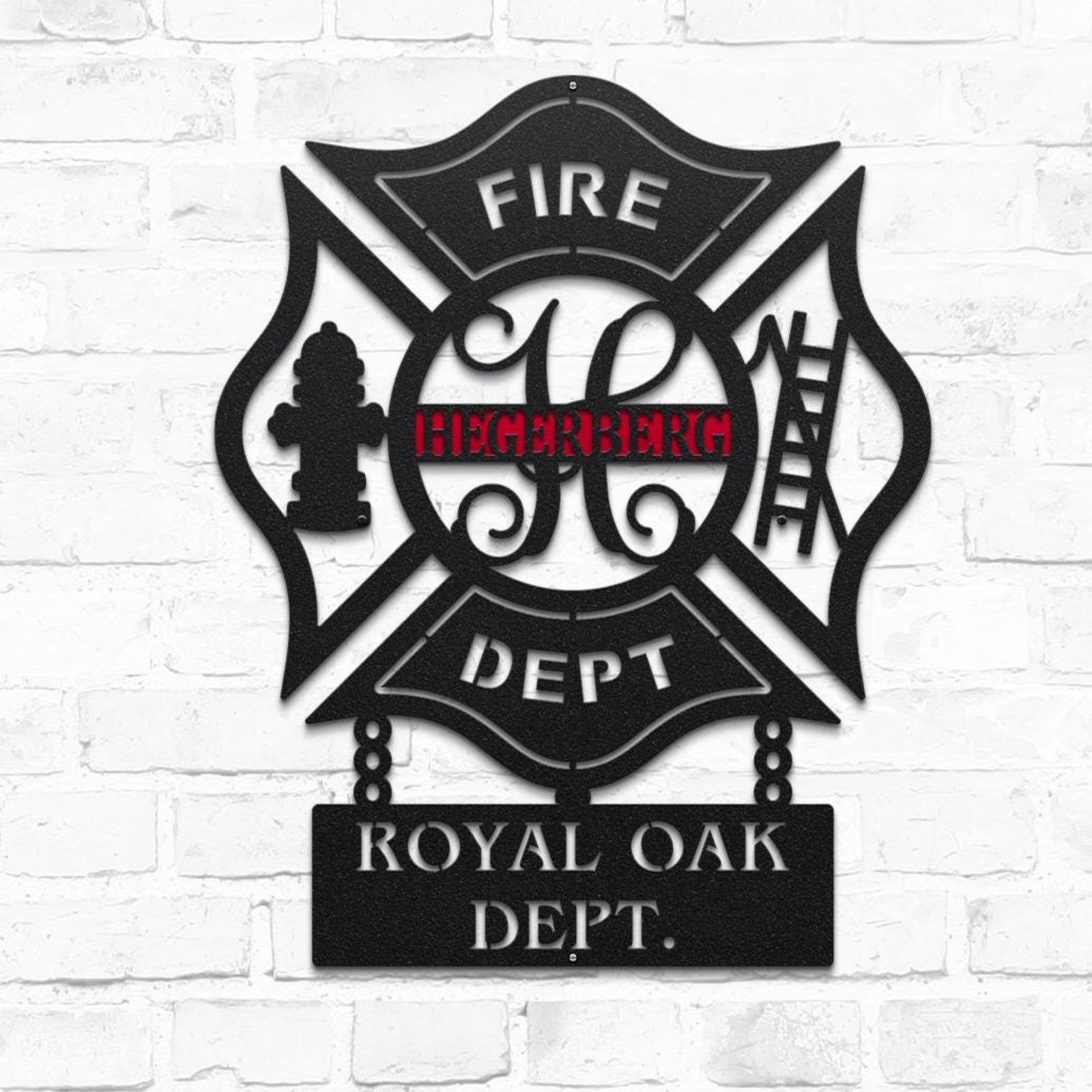 Metal wall art with 'FIRE DEPT' and 'ROYAL OAK DEPT.' text on a white brick background