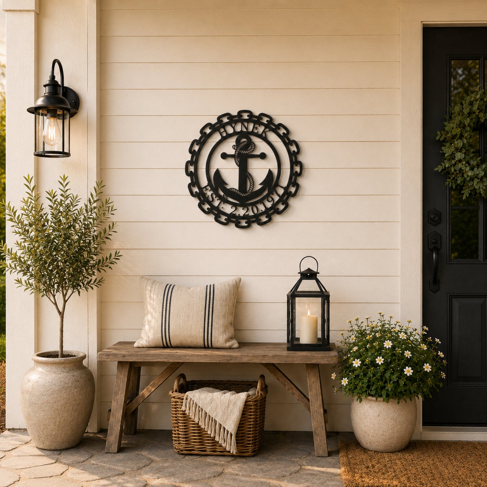 Custom anchor metal wall art with chain border and established year mounted on modern farmhouse porch wall with bench and lantern decor