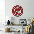 Red personalized bass fish lake house metal sign in cozy fishing themed room