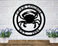 Black custom crab lounge metal wall sign with established year coastal beach house decor mounted on white brick wall