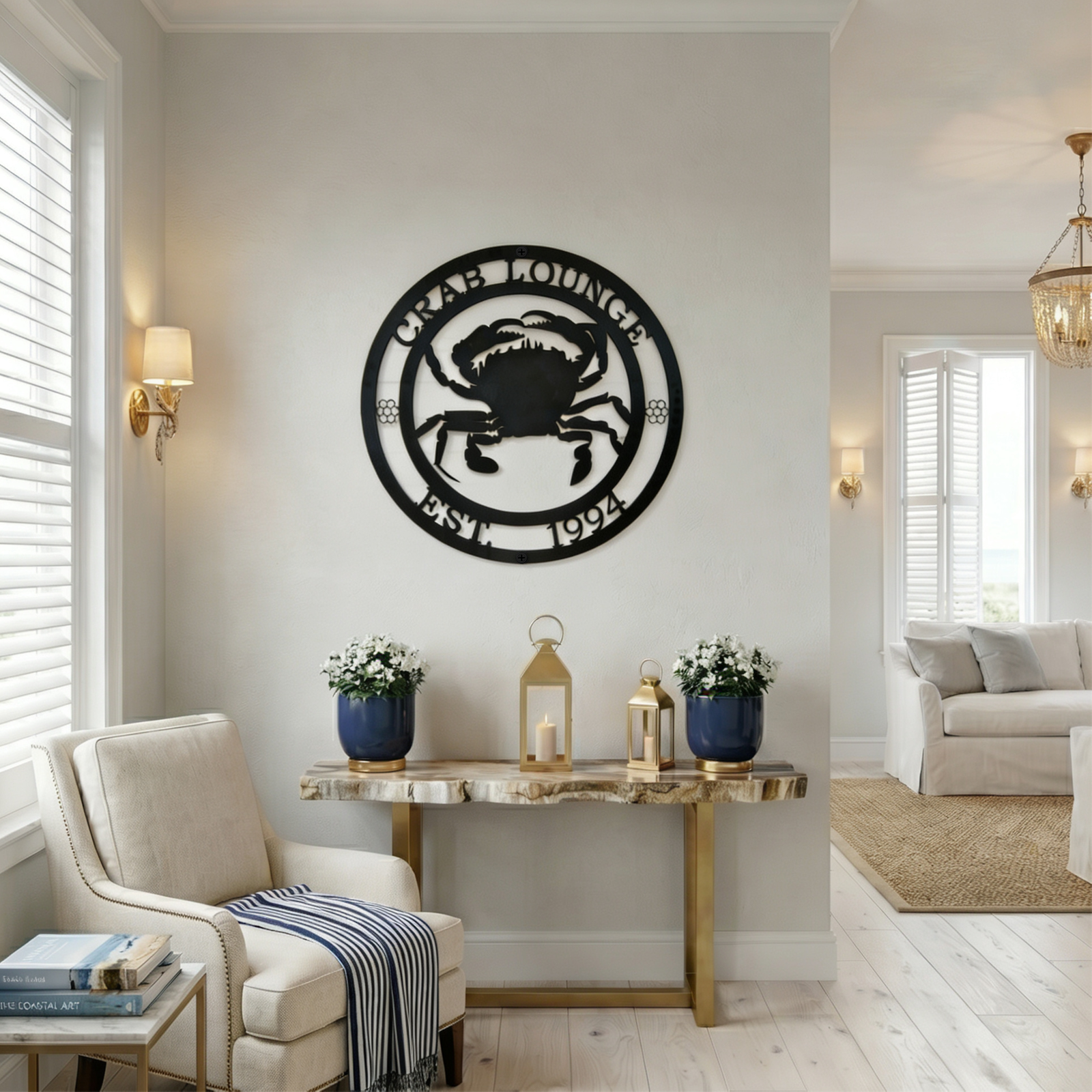 Black crab lounge metal wall decor displayed in coastal home entryway