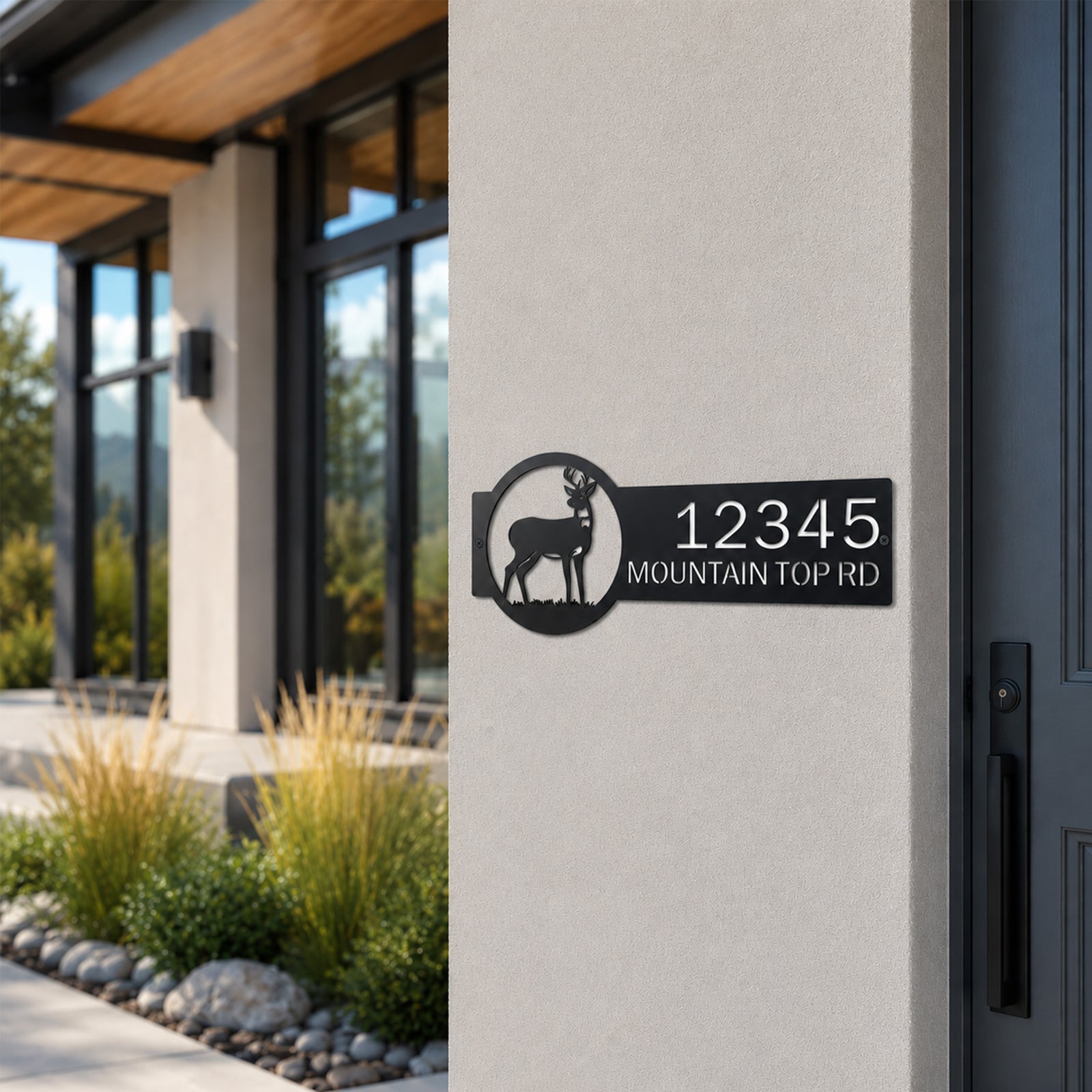 Black deer silhouette metal address sign mounted beside modern home entrance with custom house number and street name outdoor decor