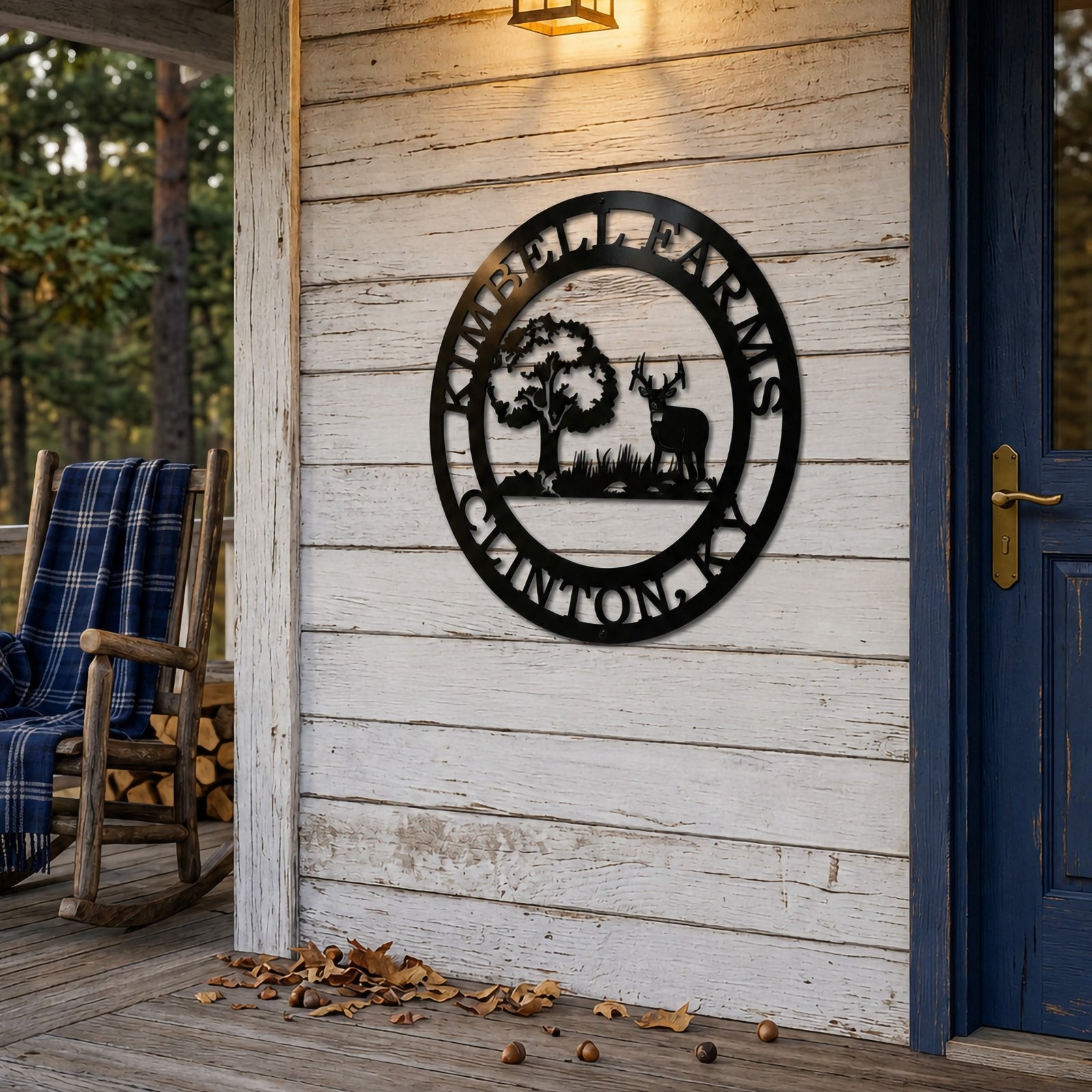 Gloss black personalized deer farm metal sign displayed on rustic porch wall beside blue door