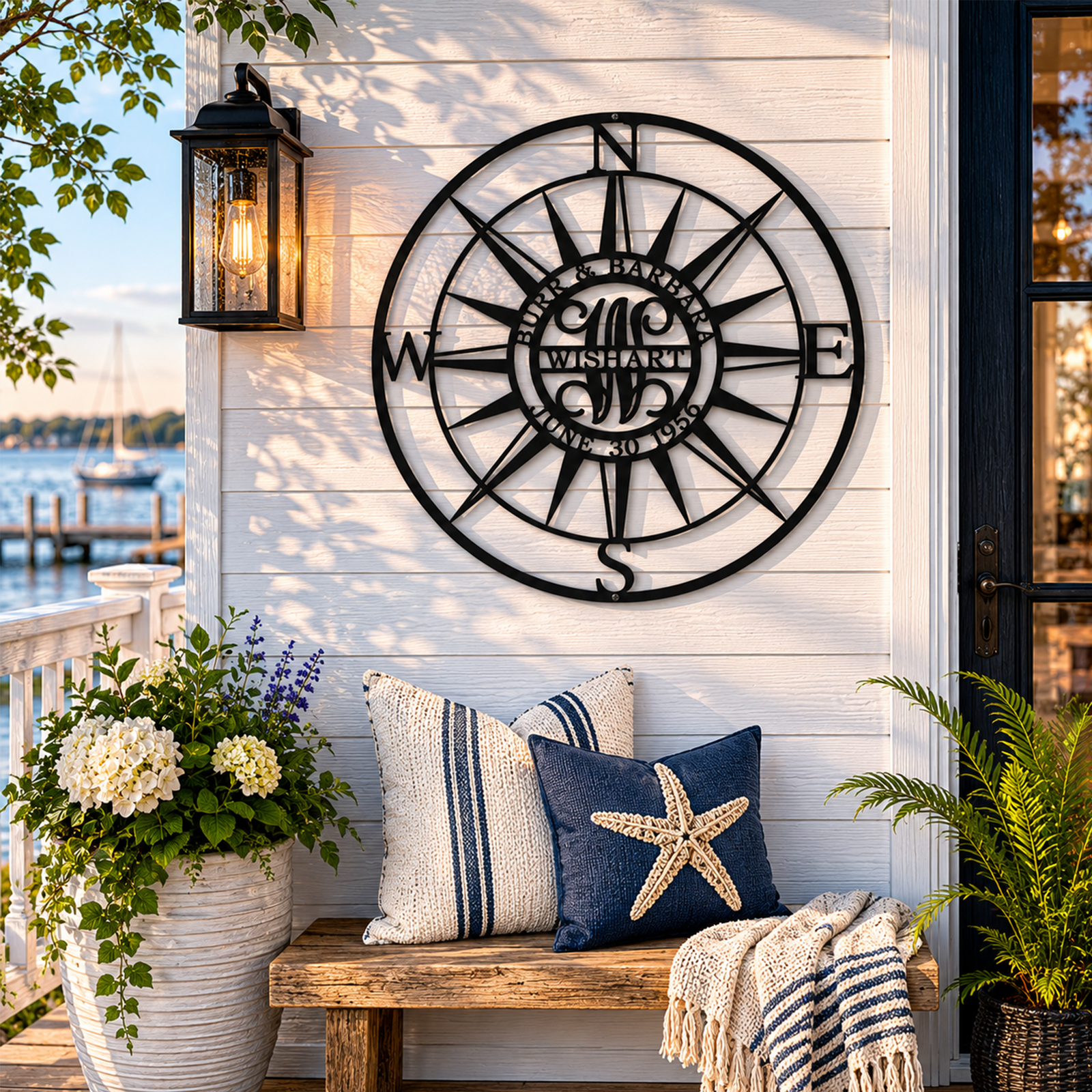 Elegant white custom metal family monogram and name sign, hanging outdoors against a contrasting dark wood background.