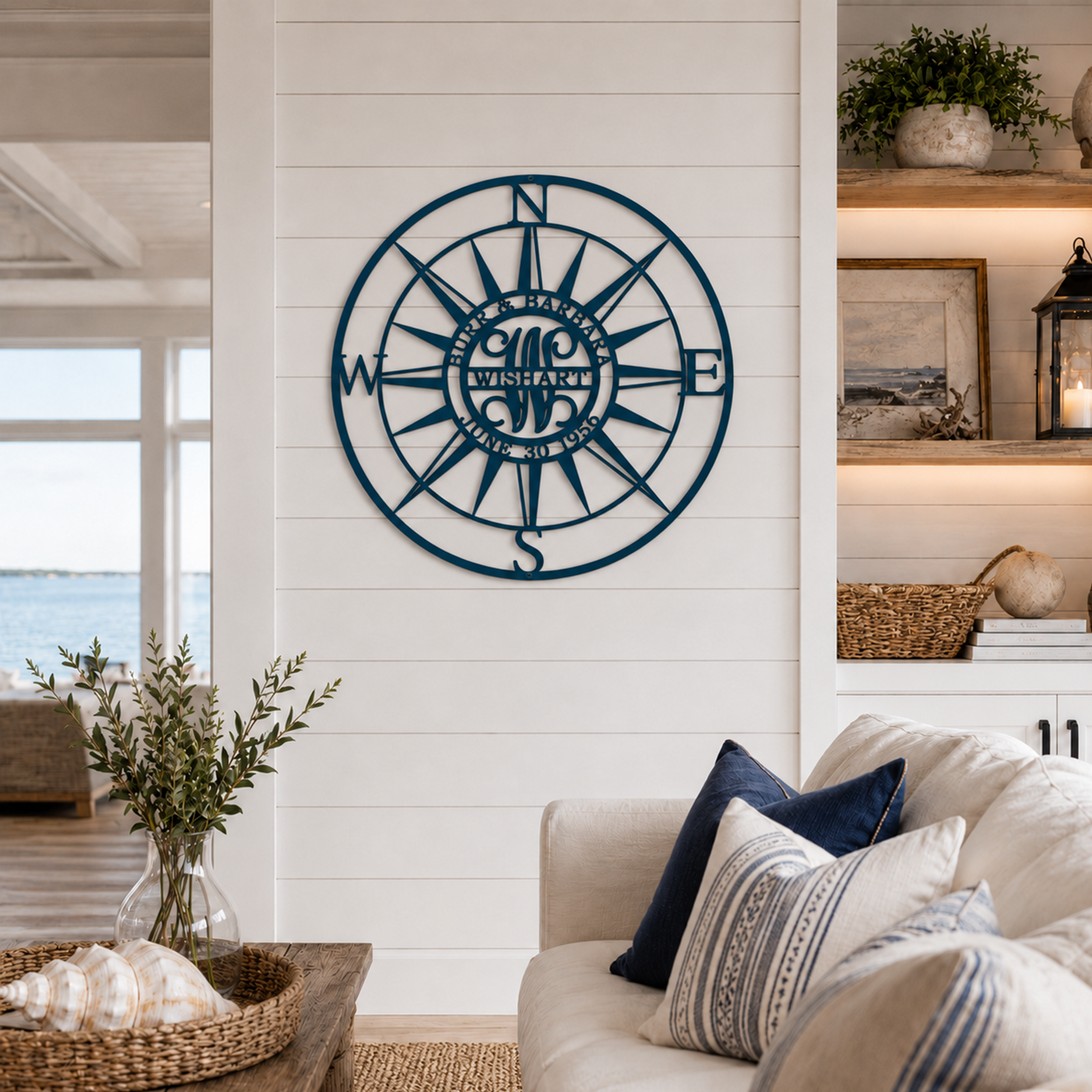 Perfect teal custom metal family name sign, prominently displayed on a light-colored exterior wall near a doorway.