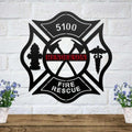 Black metal Maltese cross wall art featuring a fire hydrant, caduceus, and a custom red Henderson nameplate.