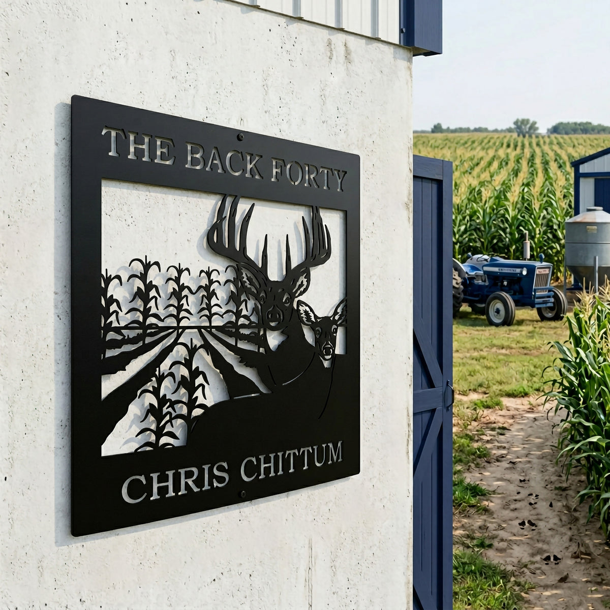 Satin black personalized hunting farm metal sign with deer and cornfield scene displayed near tractor and crop field