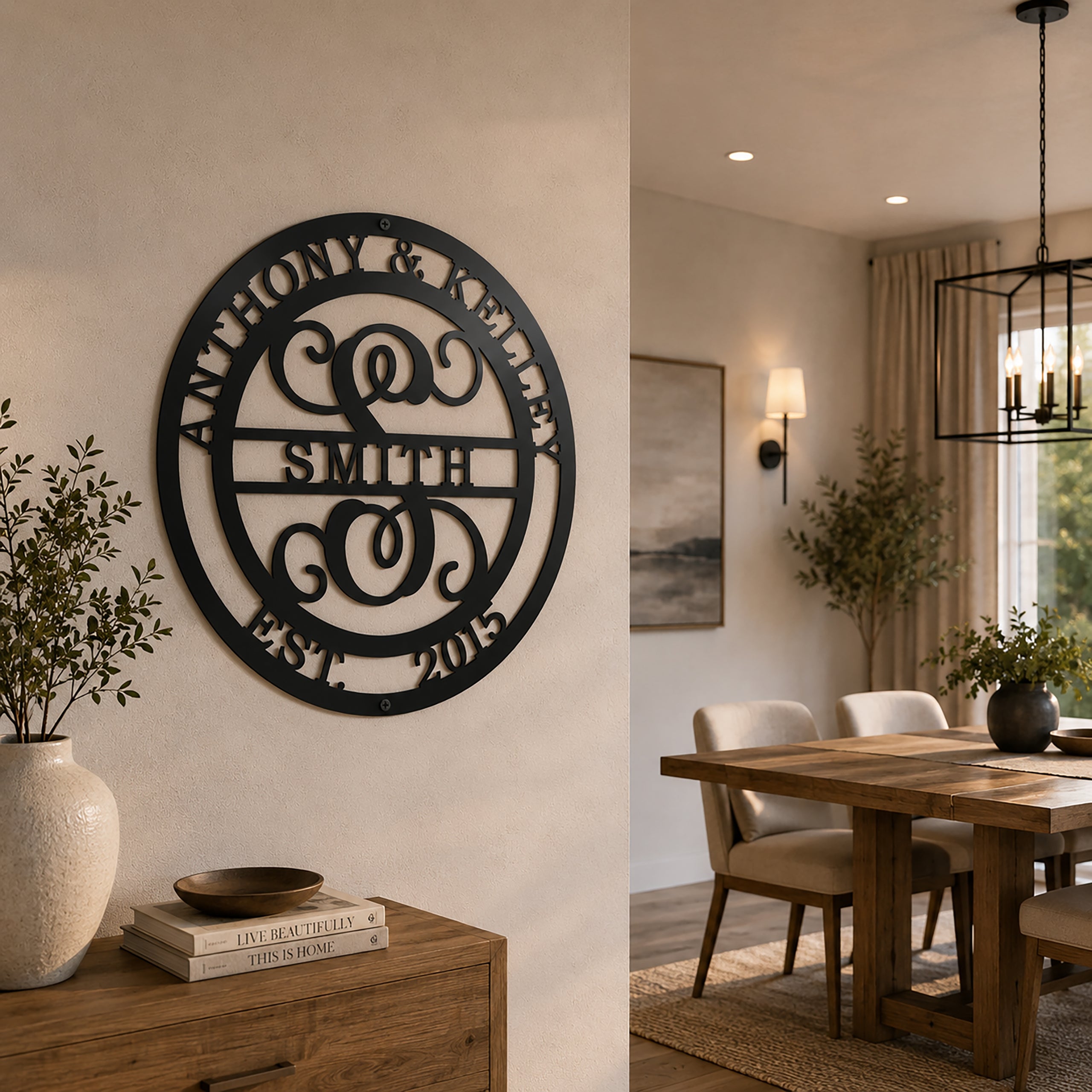 Custom Satin Black metal monogram sign featuring Anthony and Kelley, family name Smith, decorative letter S, and established date 2015 mounted on an interior accent wall in a modern dining space.