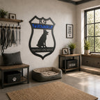 Personalized K9 German Shepherd metal sign mounted in a K9 training room with dog gear, benches, and a custom dog bed showcasing a police dog tribute design.