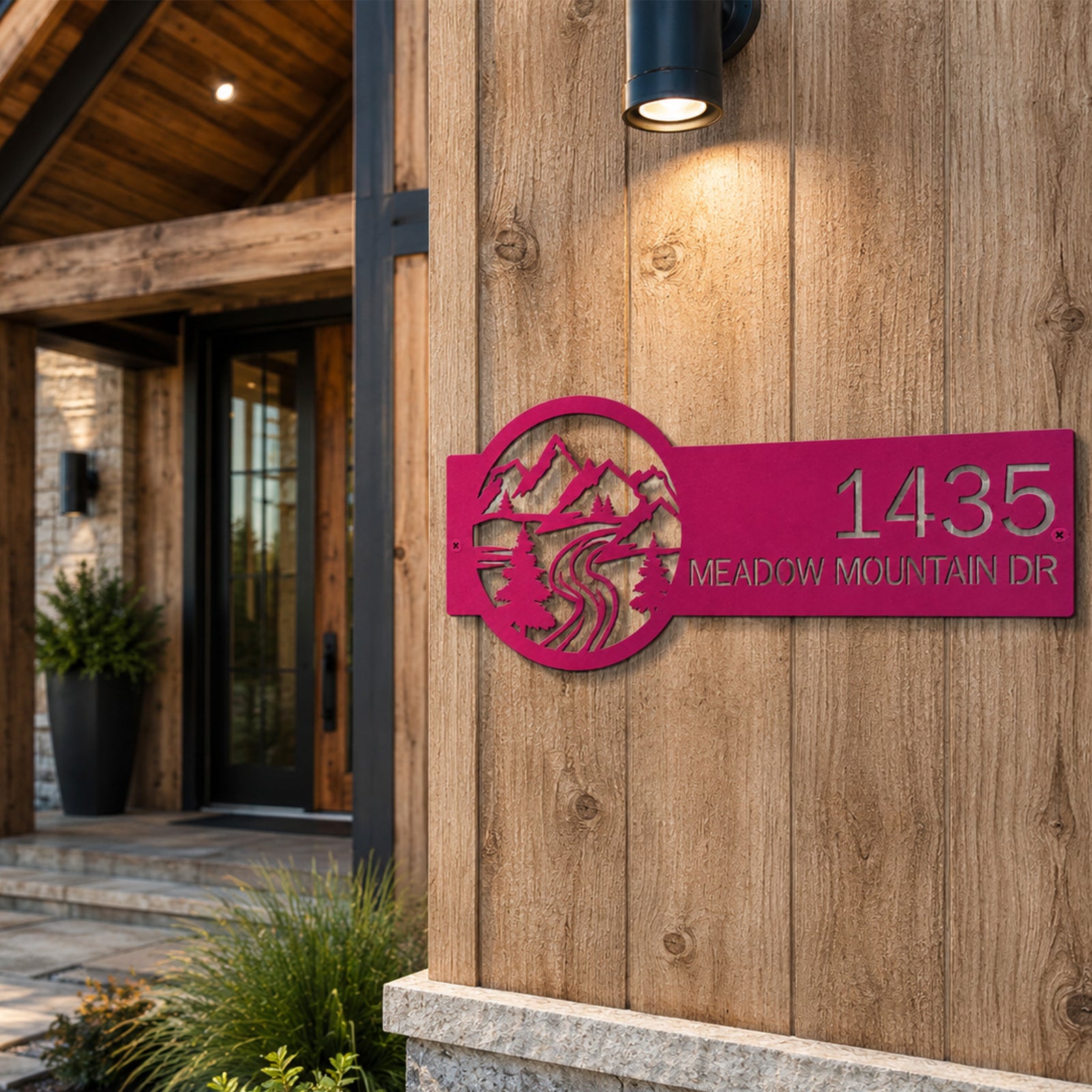Magenta custom mountain address metal plaque mounted on wood siding with mountain forest design personalized house number and street name modern outdoor decor