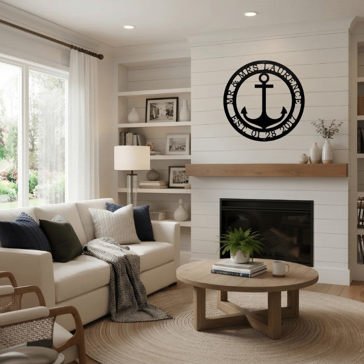 White shiplap living room featuring a custom circular metal anchor sign as a wall centerpiece.