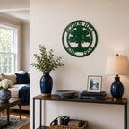 Green oak tree family name metal wall sign displayed in cozy home entryway