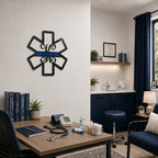 Custom EMS badge metal wall art displayed in medical office with desk and clinic supplies