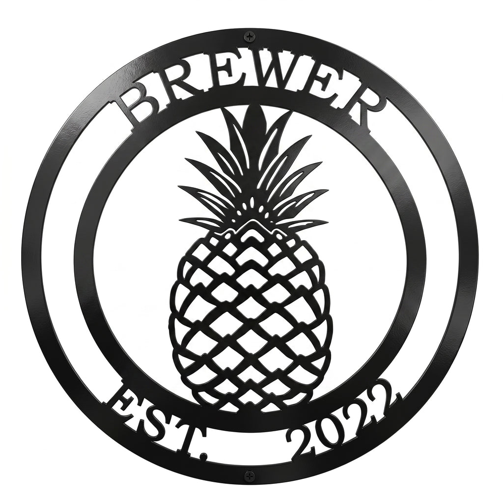 Black personalized pineapple metal wall sign with Brewer family name and established 2022 text on white background