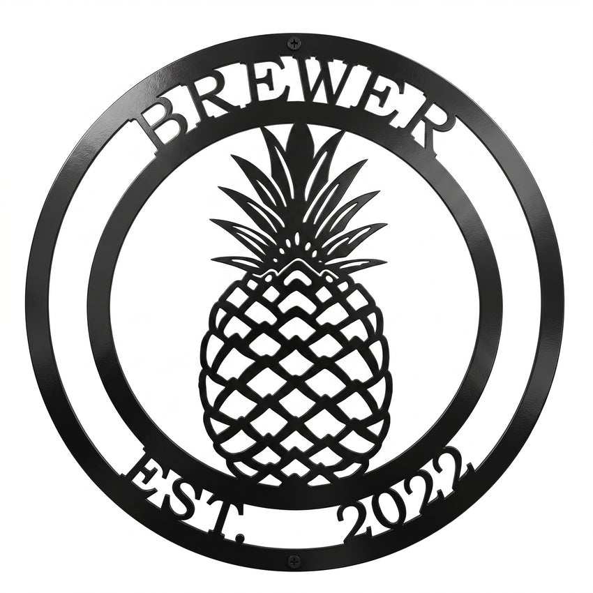 Black personalized pineapple metal wall sign with Brewer family name and established 2022 text on white background