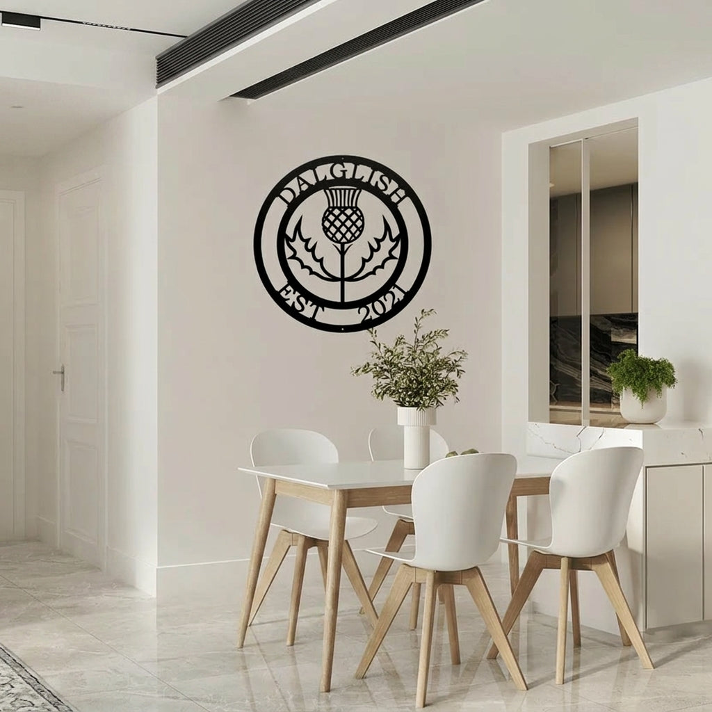 Custom Scottish thistle metal wall art displayed in a modern dining room with personalized family name and established year