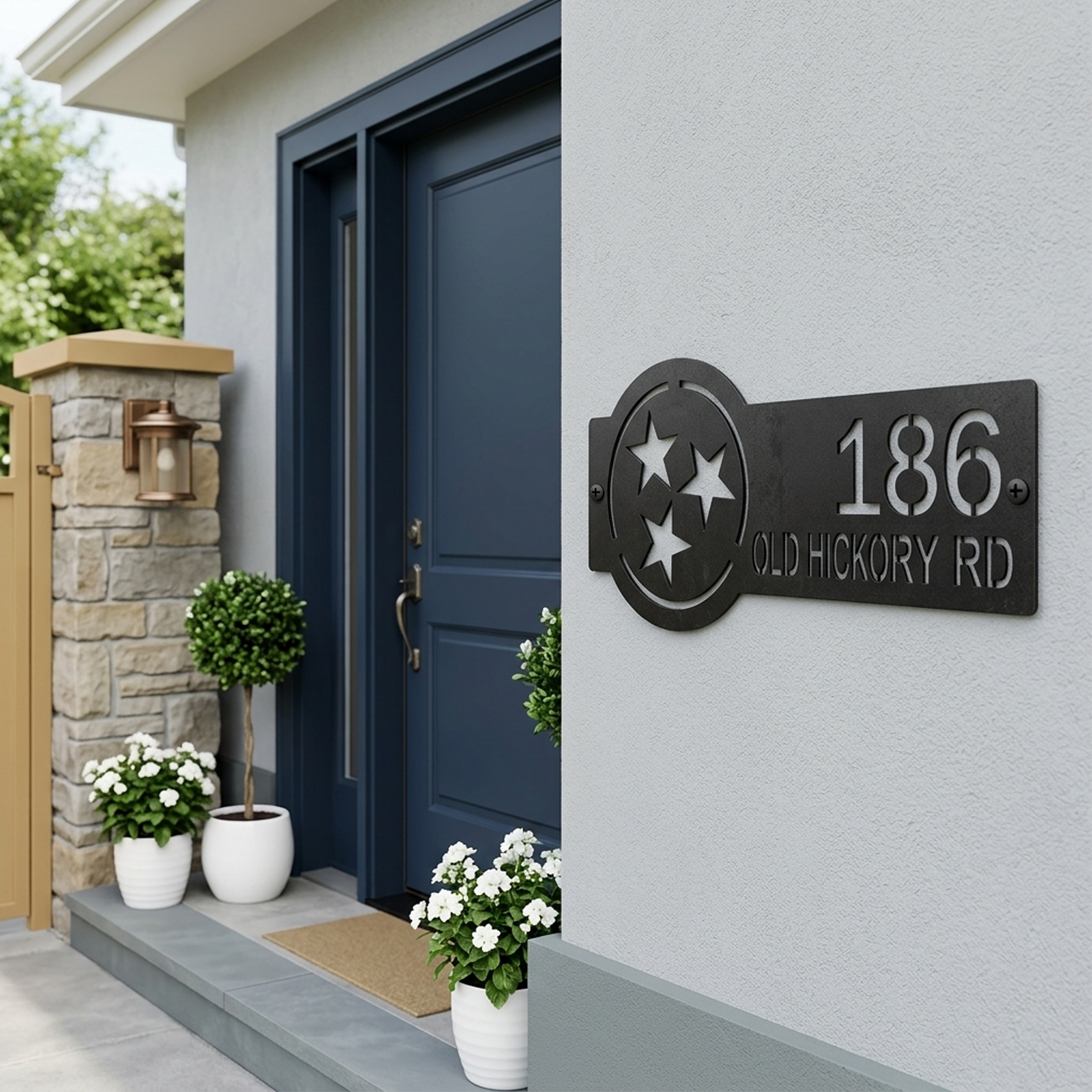 Custom Tennessee tri star metal address sign with laser cut house numbers mounted on residential gate pillar