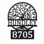 Custom black metal address sign featuring a tree design, family name Hundley, and house number 8705 on a white background.