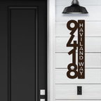 House number sign on white wall next to black door, modern outdoor address plaque, HouseSensationsArt