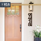 Front door with decorative house number sign and logo in corner, outdoor entryway signage, HouseSensationsArt