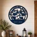 Navy blue custom ranch metal sign with farm animal silhouette mounted above rustic farmhouse console table