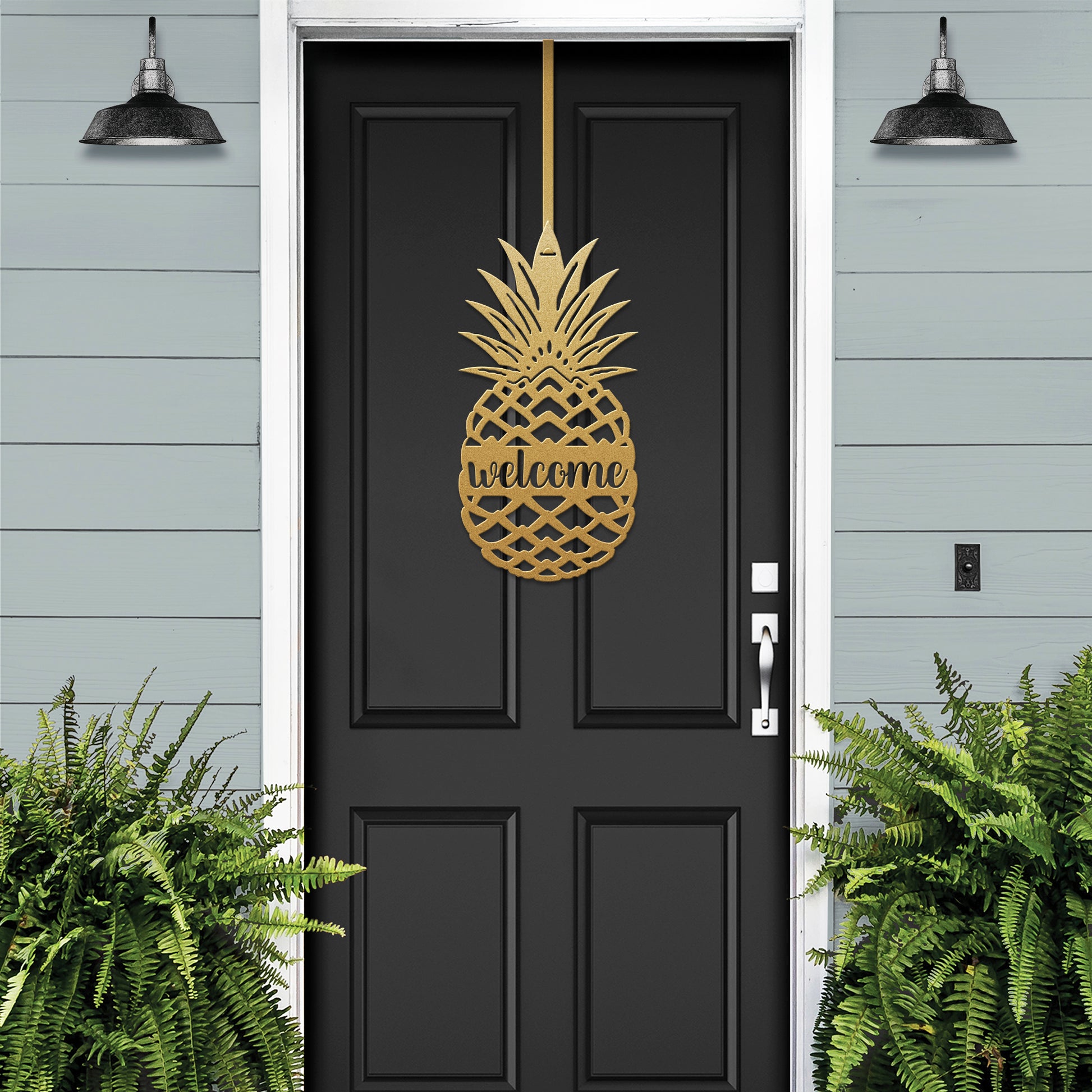 Welcome Pineapple Front Door Sign showcasing a gold pineapple symbolizing hospitality, attached to a black door, ideal for enhancing home décor with its weather-resistant, customizable features.