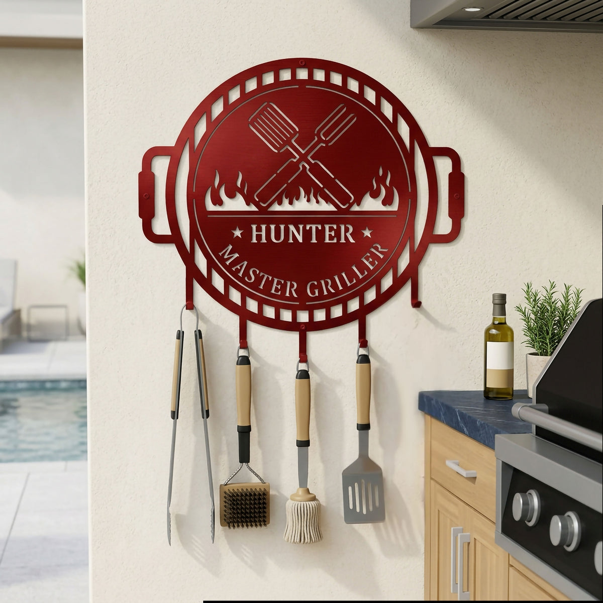 Candy apple red grill master metal tool organizer mounted beside outdoor grill with hanging barbecue accessories