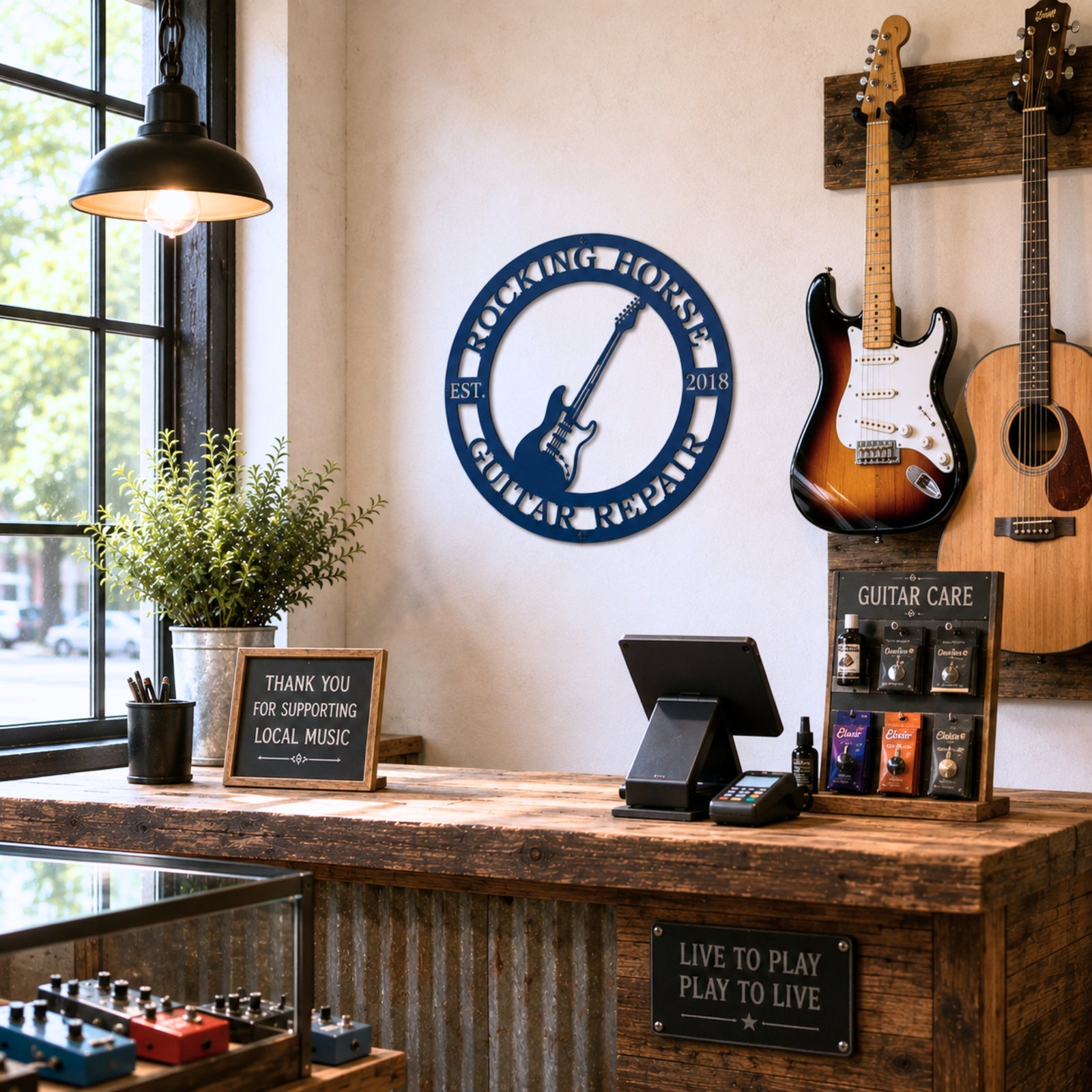 Blue personalized guitar repair metal sign mounted inside rustic guitar shop with hanging guitars counter and music accessories