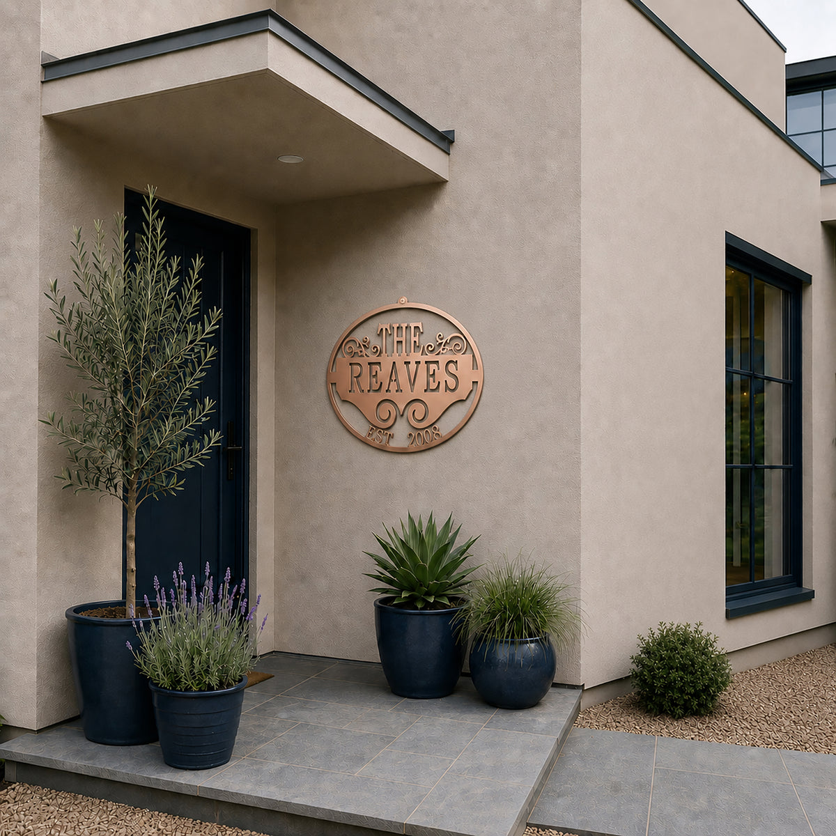 Rose gold custom family name metal wall art with established year mounted on modern home exterior wall