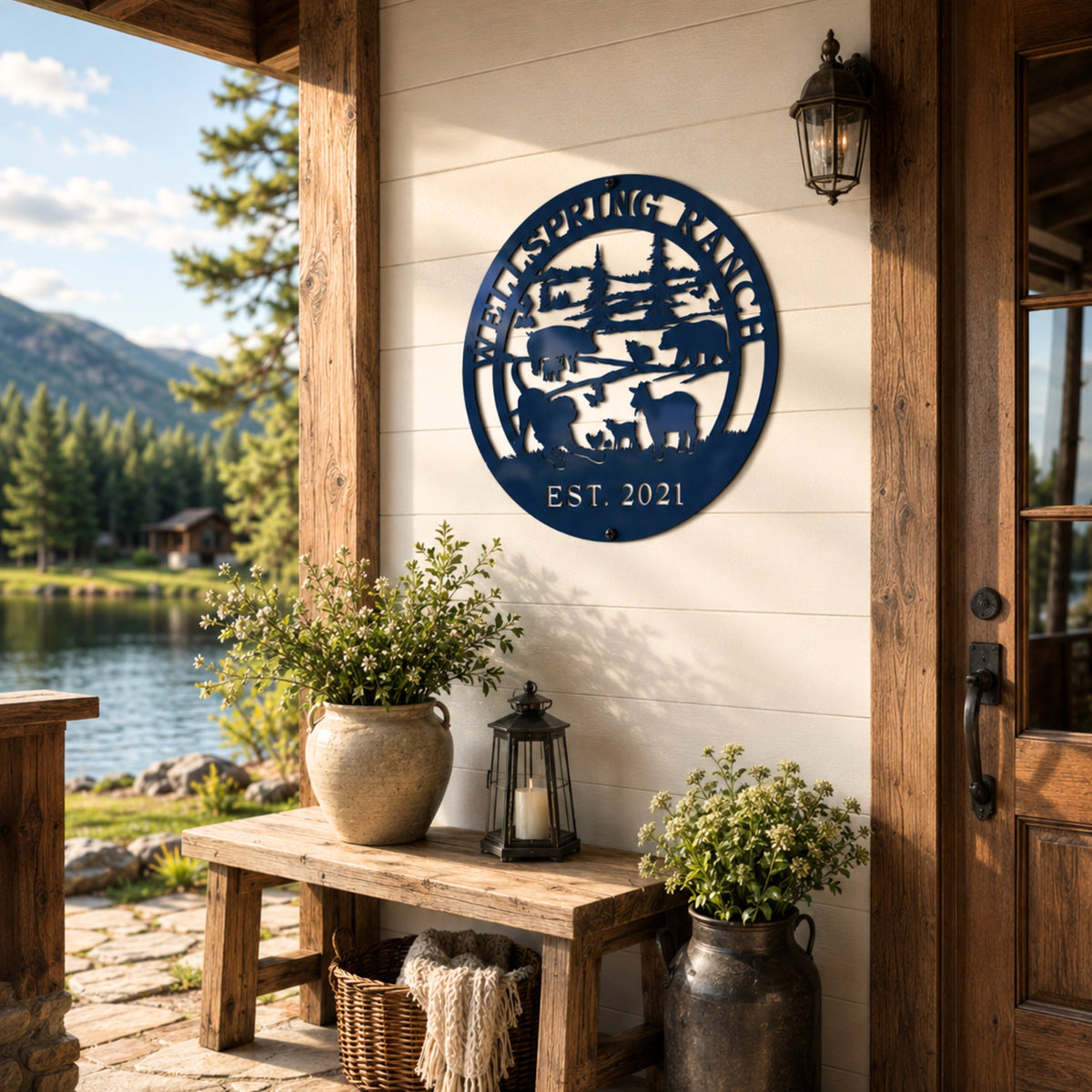Personalized ranch metal sign with cattle and forest scene displayed on cozy lakeside farmhouse porch